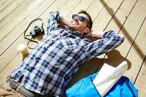 Young man relaxing on sunny day