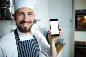 Smiley baker showing smartphone touchscreen