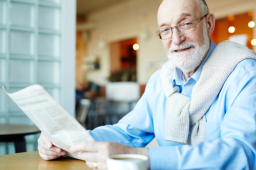 Mature man with newspaper