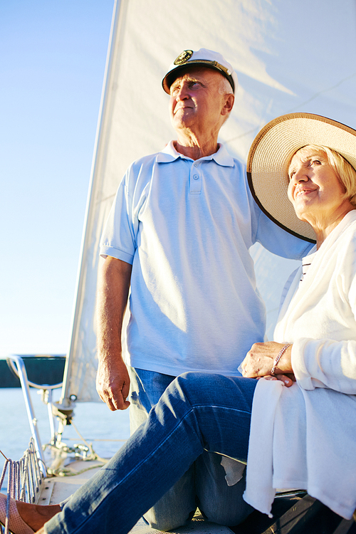 Serene pensioners enjoying their voyage on yacht