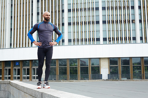 Young athlete in sportswear in urban environment