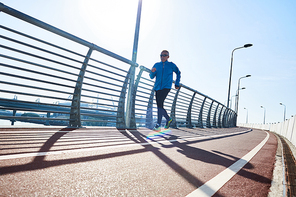 Recreational pursuit of mature sportsman on sunny morning