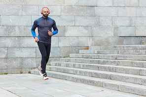 Young active man training outdoors