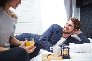 Young couple relaxing at home on weekend