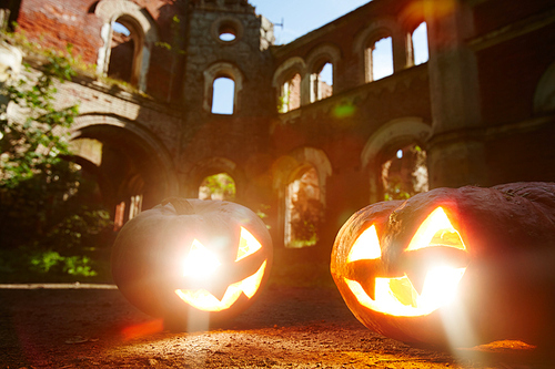 Traditional halloween jack-o-lanterns on the ground