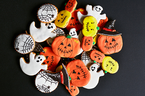Halloween treats in shapes of symbols of the holiday