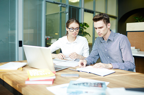 Office managers working together at new project or making research