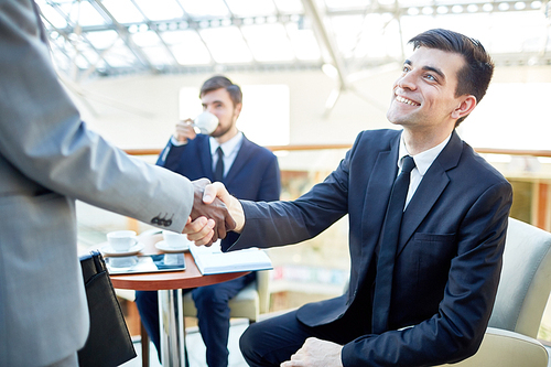 Handshake of successful bankers or lawyers before meeting