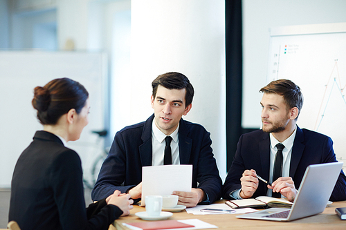 Two confident employers hiring new candidate for work