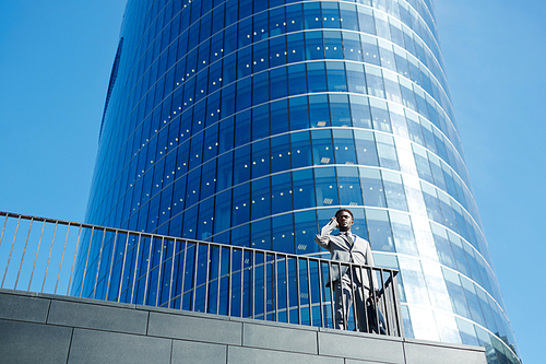 mobile agent calling his clients in urban