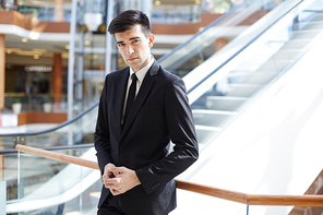 Elegant man in suit  in business center