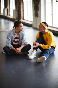 One of girls explaining her trainer some difficult moments about trainings at break