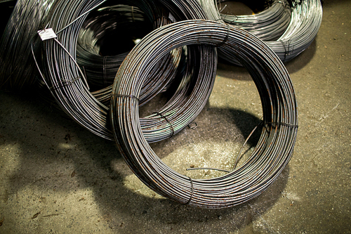 Bunches of iron wire bound into circle and tied up with thin metallic threads