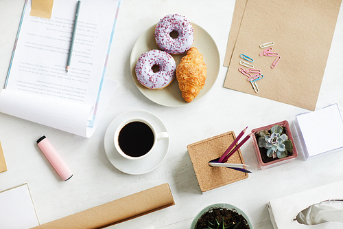 Background of office workplace with business stationary, snack and black coffee