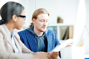 Businessman working with his colleague during a meeting