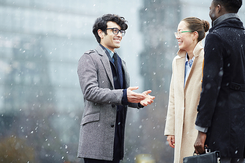 Businessman meeting his partners in snowfall