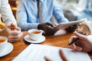 Hands of business leaders during negotiation