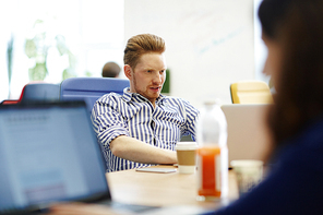 Businessman concentrating on reading online data