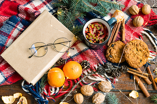 Xmas background with set of objects, symbols and traditional food and drink on wooden table