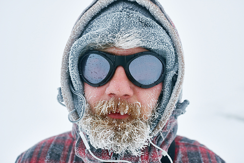 Portrait of a man traveling in winter