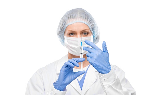 Female doctor in surgical gloves moving air bubble from syringe while preparing for injection