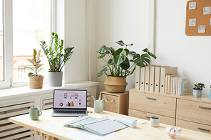 Background image of cozy home office workplace with minimal and natural design, copy space