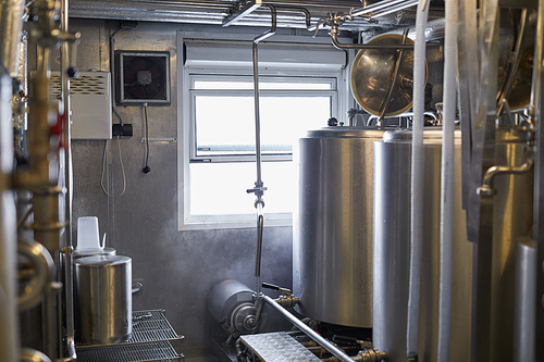 Background image of steel machine units at workshop in industrial food factory, copy space