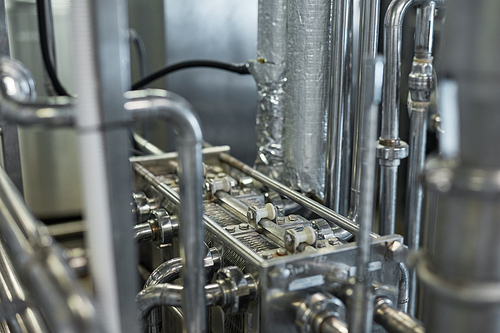 Close up background image of steel connection rods of machine unit at industrial plant, copy space