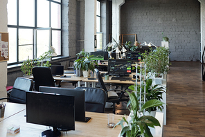 Large classroom or computer class or open space office with monitors on desks