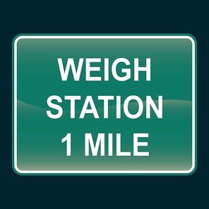 weigh station 1 mile sign