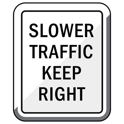 slower traffic keep right road sign