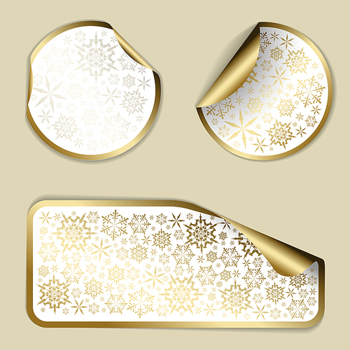 Golden Christmas vector labels and stickers with white border and snowflakes pattern