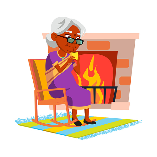 Elderly Woman Drinking Tea In Living Room Vector. Indian Old Lady Sitting In Chair Near Fireplace And Drink Hot Tea. Character Mature Person Enjoy Delicious Beverage At Home Flat Cartoon Illustration