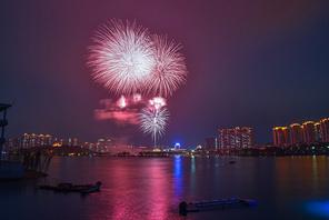 night scene,Fireworks,At night,The city,The river,construction,Holiday,The bridge,Travel,No one,The sky,twilight,Sunset,reflex,light,cityscape,building,skyline,Downtown,Lighted,