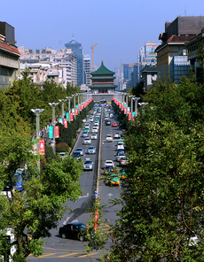 humanities,documentary,scenery,wild goose pagoda of xi'an,outdoors,street,building,The sky,tree,Downtown,traffic,The city,cityscape,The road,Small town,waters,skyline,high building,The bridge,Daylight.