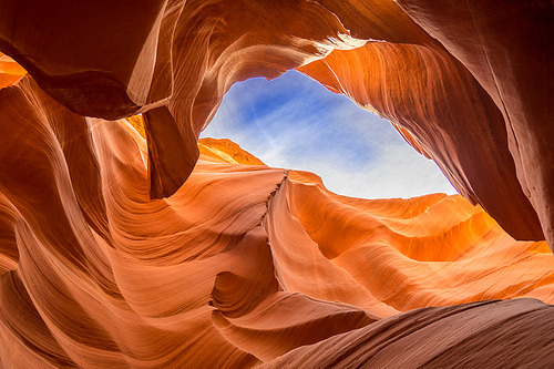 The United States of America.,Of course.,scenery,Travel.,color,antelope canyon,The arts.,dawn,Fire.,landscape,corrosive action,sand,outdoors,rock,The sky.,slot,Geology.,wind