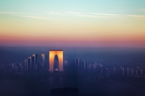 scenery,canon,The city.,color,The Orient Gate.,The sky.,Downtown.,skyline,construction,Travel.,outdoors,The sun.,cityscape,silhouette,waters,light,The moon.,skyscraper,fog