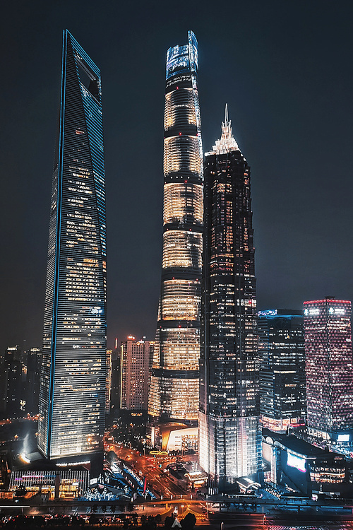 A cell phone.,Travel.,The city.,cityscape,skyline,Downtown.,building,twilight,The office.,high building,Business.,The sky.,finance,Tall.,At night.,No one.,Hyundai.,The river.