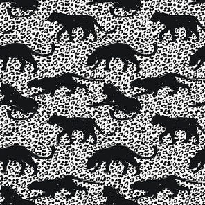 Seamless exotic pattern with abstract silhouettes of animals. Vector hand draw illustration.