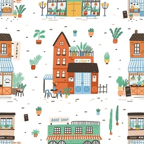 Seamless pattern with city buildings on white background. Backdrop with facades of bakery or bakeshop, book store, plant shop. Cute flat vector illustration for wrapping paper, textile print