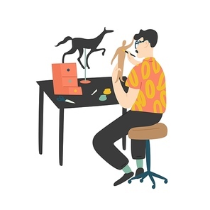 Young man sitting at desk and painting handcrafted miniature paper model figures isolated on white . Male character enjoying his hobby at home. Flat cartoon colorful vector illustration