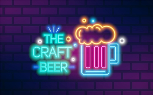 Bright glowing neon light the craft beer sign vector flat illustration. Colorful glass mug with foamy malt beverage isolated on brick wall background. Signboard with design elements of bar or pub.