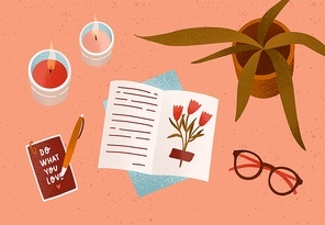 Notepad or diary with dry beautiful flower and writing text surrounded by cosiness things on desk vector flat illustration. Top view of cozy workplace organization with candles, accessories and plant.