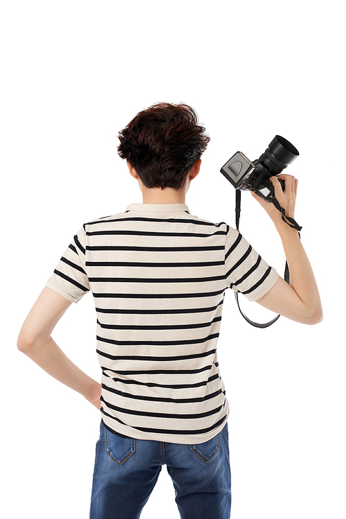 Rear view of photographer with camera, isolated on white
