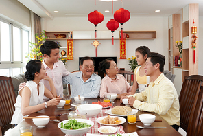 Big Vietnamese family gathered at Tet table