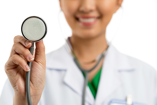 Close-up image of doctor with stethoscope in hands, selective focus