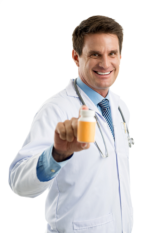 Smiling handsome family doctor giving vitamins to patient