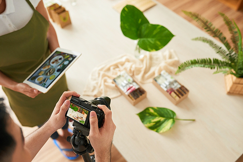 People photographing soap they made for the online shop