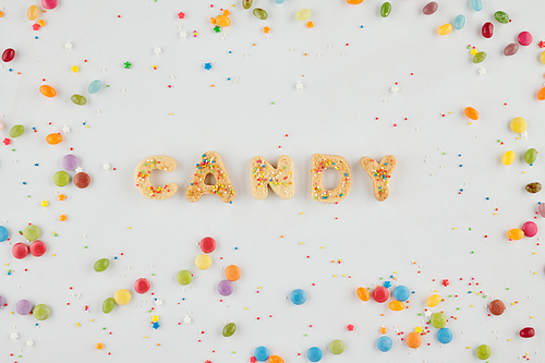 Word candy made of homemade cookies decorated with sprinkles