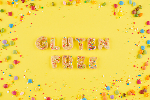 Gluten free words made of sweet delicious cookies and decorated with colorful sprinkles